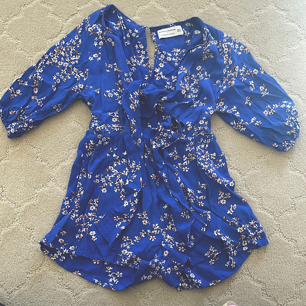 Bright blue tie front romper from Faithful the Brand x Anthropologie!